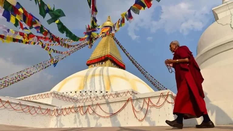 Monk circulating around Bouddhanath Stupa
