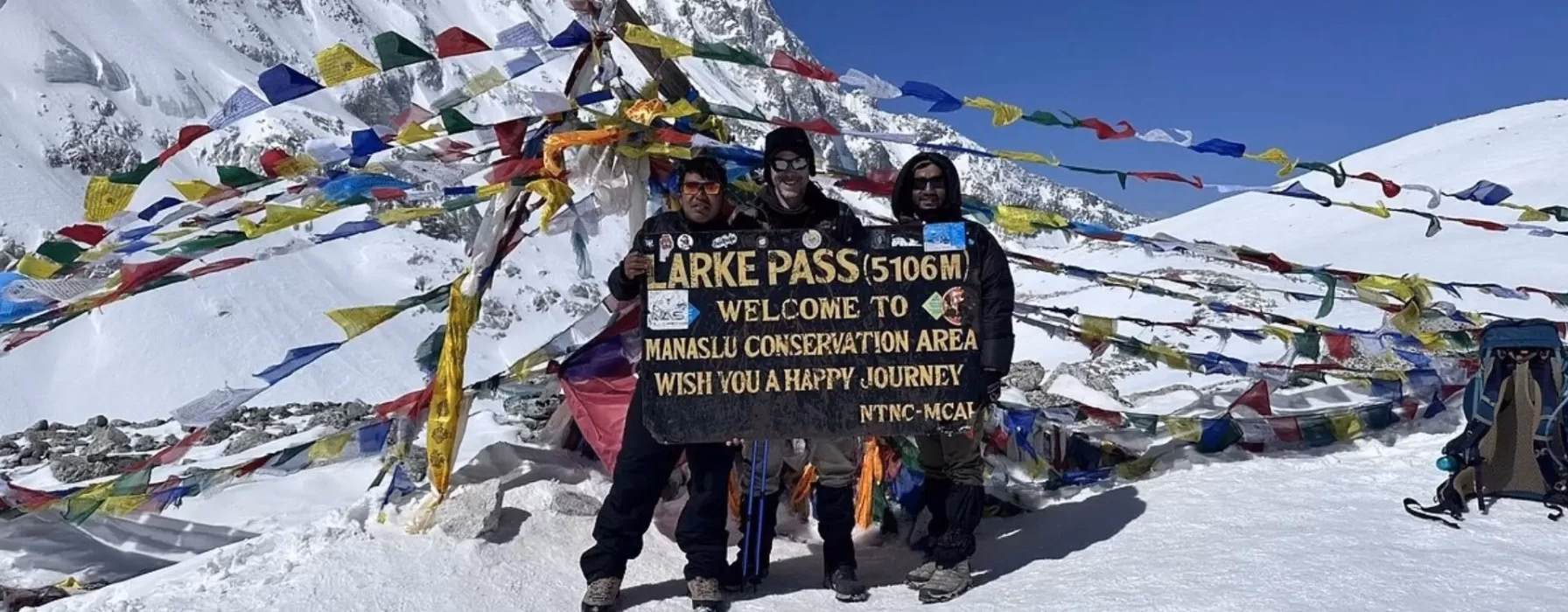 trekkers at Larke Pass in the Manaslu Region