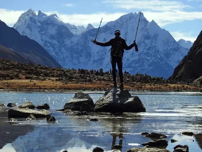Two visitors enjoying view of Gokyo Lake