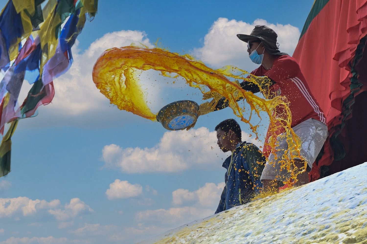 Locals coluring the dome of Bouddhanath Stupa