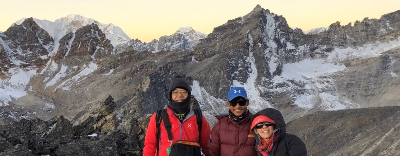 Trekkers posing in the Himalayas