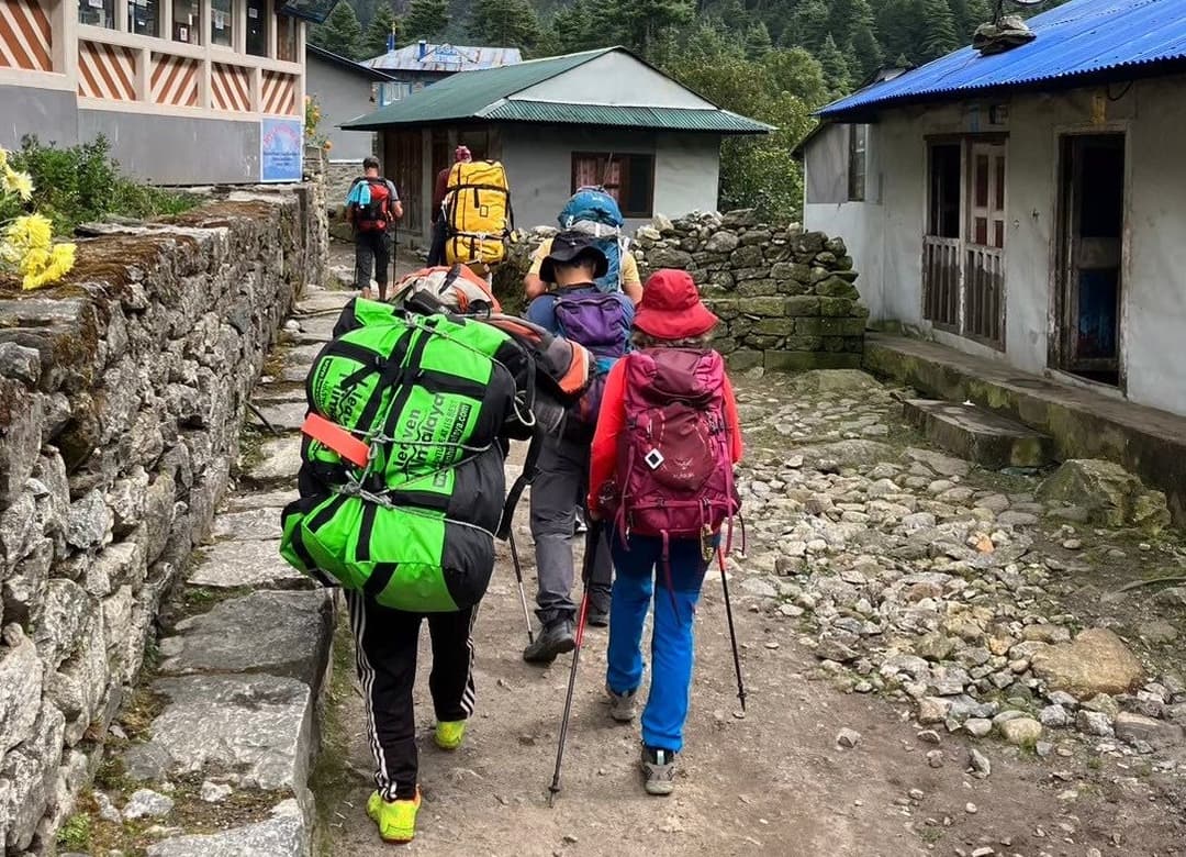 Porter carrying guest bag in EBC trek