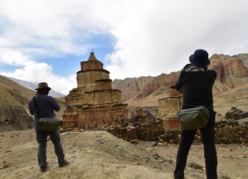 Tourist capturing moments on the way to Mustang