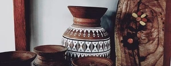 Traditional wooden Nepalese Theki and Madani butter churning vessels