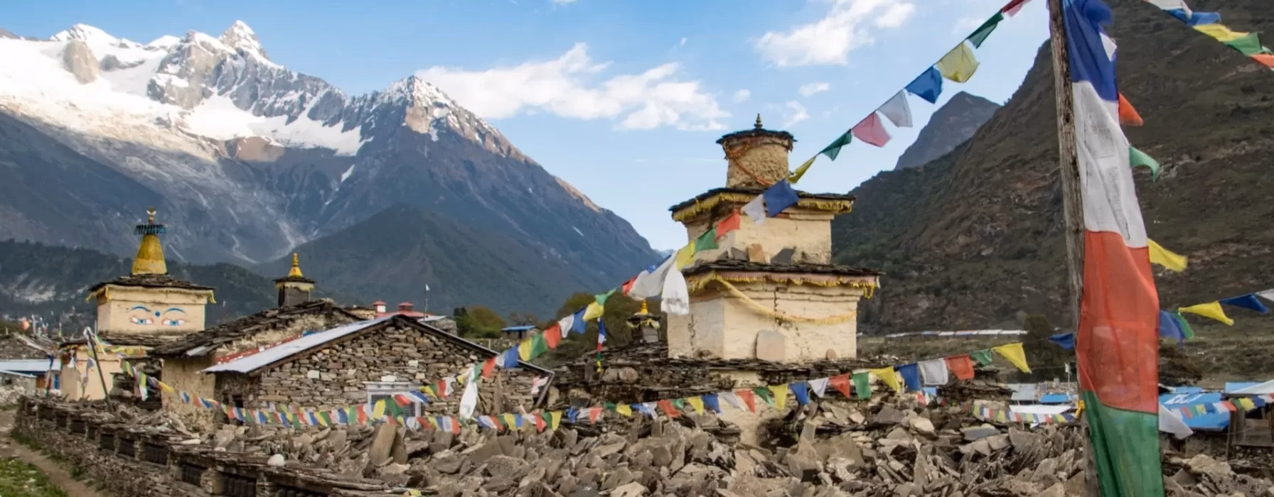 Gomaps and prayer flags in samagaun