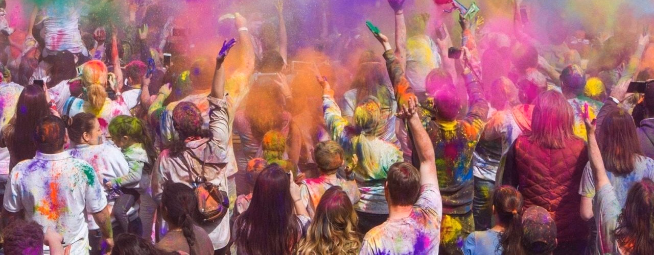Locals with Foreigners Celebrating Holi