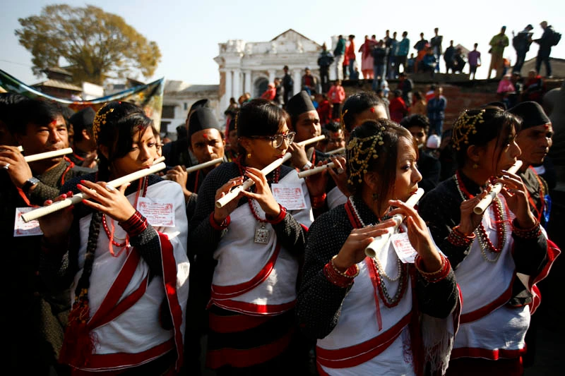 Newari People celebrationg yomari Punhi