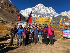 a group of trekkers at annapurna base camp