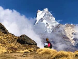 a trekking guide in front of Mardi Himal, i.e Machhapuchhre mountain