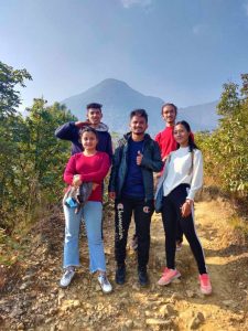 group of travelers posing during champadevi hiking 