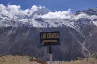 A sign board directing to Yak Kharka in Annapurna Circuit