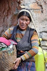 Nepali women in her traditional attire trying to speak in Nepali Language