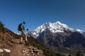 A trekker walking towards Manaslu Base Camp from Samagaun