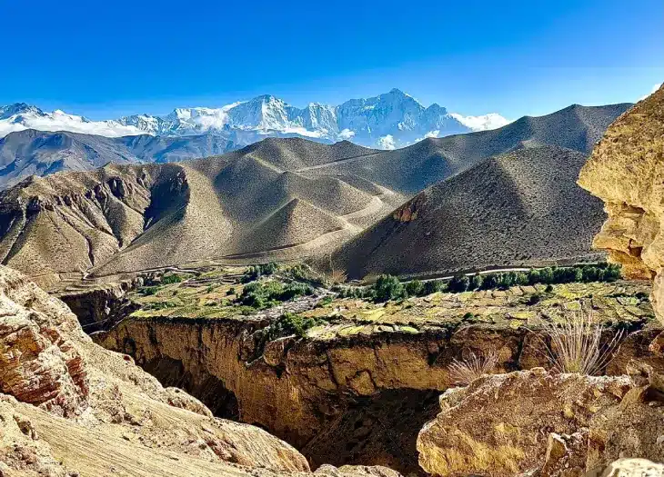 View of plain, sand hills and mountains as captured during Upper Mustang Trek