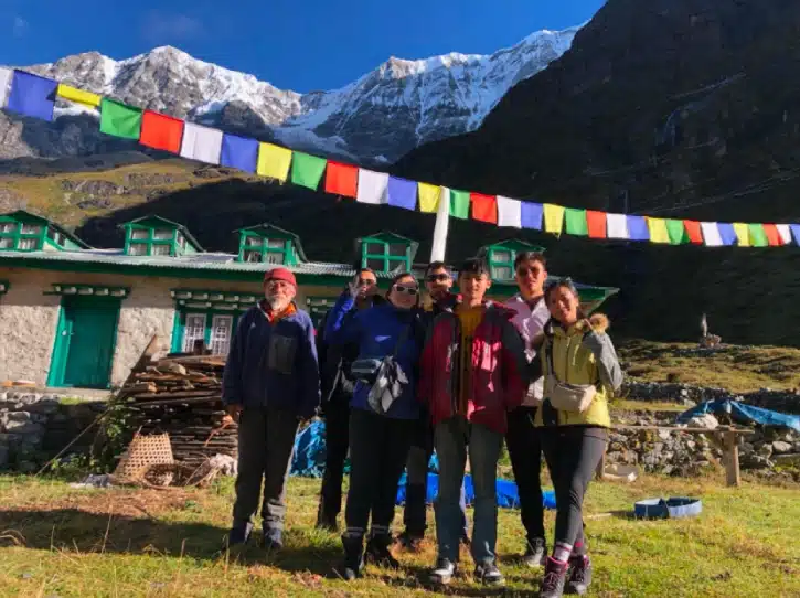 A group of friends in front of Rolwaling range on the way to Tsho Rolpa 